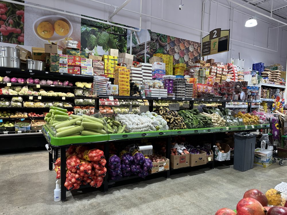 Storefront or interior of Foodland Halal Market — Malden
